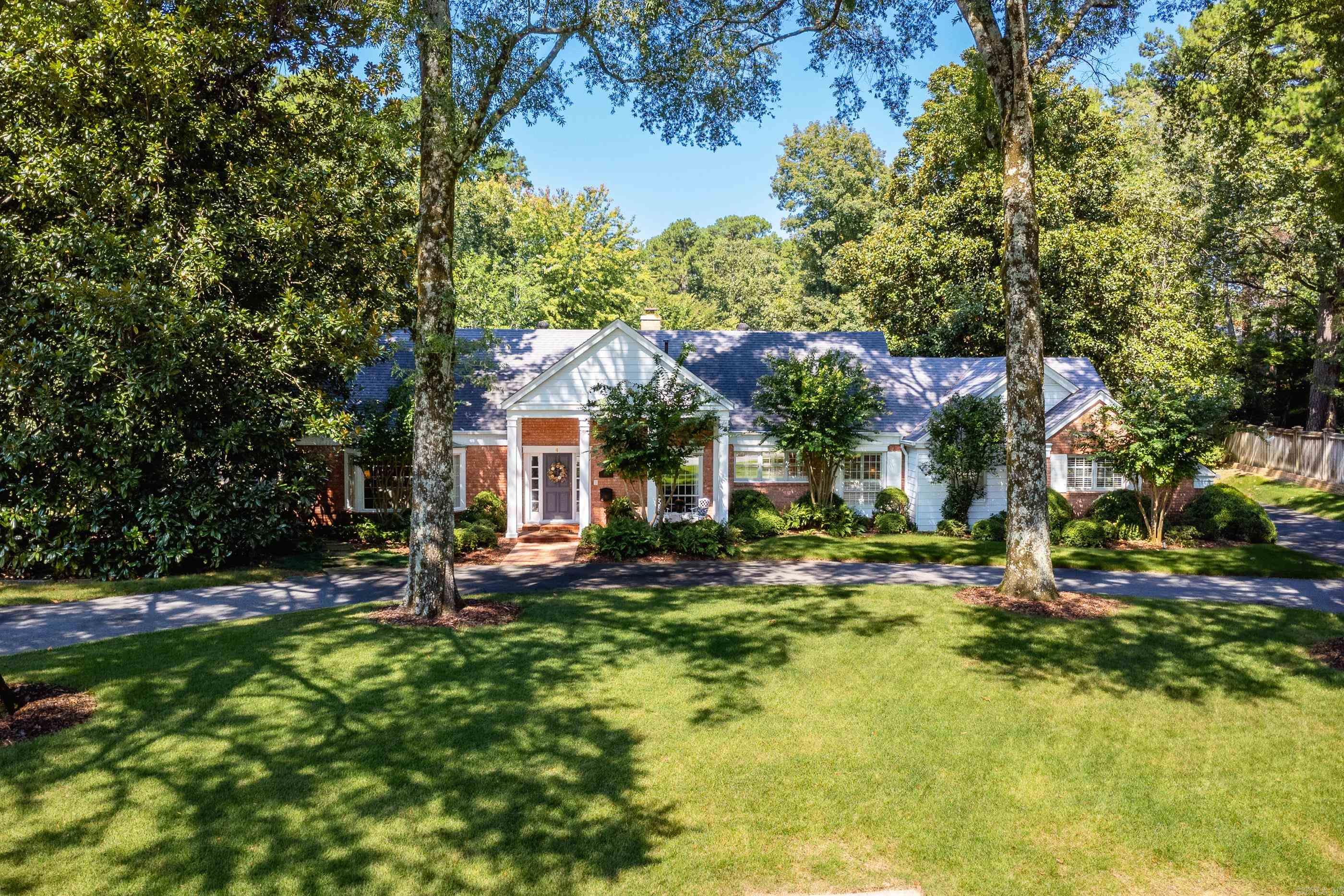 Welcome to this exquisite home located in the highly sought-after Robinwood neighborhood. Set back from the street with a beautifully landscaped front yard and circle driveway, this 4-bedroom, 3.5-bath residence combines elegance, comfort, and modern updates. Inside, hardwood floors flow through the main living areas, complemented by an updated kitchen and baths. The remodeled, spacious primary suite is a true retreat, featuring walk-in closets, double vanities, a Janson whirlpool tub, walk-in shower, exercise room, and access to the sun-room (227sf included). All new carpet has been added upstairs and in the primary suite. Additional highlights include a sun-room overlooking pool with a full bath, an encapsulated crawlspace, and a versatile bonus room upstairs perfect for kids or grand kids to create their own play haven (206sf not included). Outdoor living shines with a heated pool, large backyard, and ample space to relax or entertain. The property also offers thoughtful extras such as a second oven and additional refrigerator in the garage. With plenty of parking, beautiful landscaping, and an unmatched location, this home offers luxury living at its finest. Come See!!