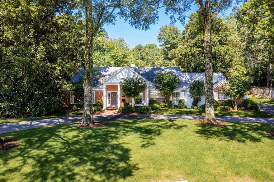 Welcome to this exquisite home located in the highly sought-after Robinwood neighborhood. Set back from the street with a beautifully landscaped front yard and circle driveway, this 4-bedroom, 3.5-bath residence combines elegance, comfort, and modern updates. Inside, hardwood floors flow through the main living areas, complemented by an updated kitchen and baths. The remodeled, spacious primary suite is a true retreat, featuring walk-in closets, double vanities, a Janson whirlpool tub, walk-in shower, exercise room, and access to the sun-room (227sf included). All new carpet has been added upstairs and in the primary suite. Additional highlights include a sun-room overlooking pool with a full bath, an encapsulated crawlspace, and a versatile bonus room upstairs perfect for kids or grand kids to create their own play haven (206sf not included). Outdoor living shines with a heated pool, large backyard, and ample space to relax or entertain. The property also offers thoughtful extras such as a second oven and additional refrigerator in the garage. With plenty of parking, beautiful landscaping, and an unmatched location, this home offers luxury living at its finest. Come See!!