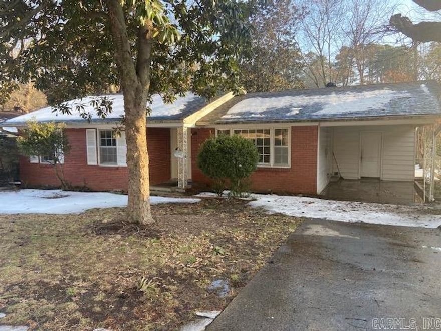 A perfect, one level, brick and siding with a one car carport. Roof in 2025  A great starter home on a great street in a nice neighborhood. Fresh interior paint. A large fenced backyard. Sunroom off the kitchen area. Refrigerator's to convey. Nice hardwoods, and new laminate flooring in the kitchen area.   Easy to show.