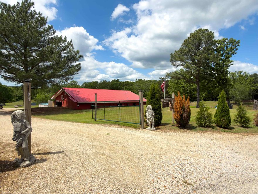 Escape to Your Private 15-Acre Homestead! Discover the perfect blend of sustainable living and modern convenience with this unique 15-acre (m/l) mini-farm featuring a cozy, energy-efficient 3-bedroom, 2-bathroom earth-berm home. Spanning approximately 1,500 sq. ft., this residence offers a peaceful sanctuary protected by a secure gated entry and a lush, park-like setting complete with your own private pond. Whether you dream of a self-sufficient lifestyle or just want room to breathe, this unrestricted property is ready for your vision. The grounds are fully equipped for a turnkey homestead, featuring a fenced dog run, a dedicated chicken coop, and prime garden spots with rich potential. Storage is never an issue with two versatile outbuildings (one featuring electricity for a workshop or hobby space) and a detached carport. Enjoy the best of both worlds: total rural freedom with no restrictions, yet located just minutes from the heart of Highland. You’ll have quick, easy access to local schools, medical facilities, and shopping centers while remaining tucked away in your own private woods. This is a rare opportunity to own a functional, versatile farmstead in a premier location.