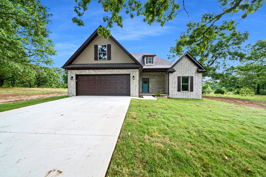 If you're seeking a country lifestyle, look no further.  This 1777 sq ft home featuring 3/2 is situated on 1.42 acres and is ideal for a family desiring a place for a barn or shop.  The living area is spacious and boosts a beautiful fireplace with a solid wood mantel. The dining area features a wall of windows, offering tranquil and serene views.  The kitchen has a beautiful granite top island with hanging pendent lights.  The walk-in pantry provides abundant storage space. The kitchen sink is positioned to take advantage of the outdoors.  Don't delay!  Seller will contribute up to $5000K in closing costs and prepaids.