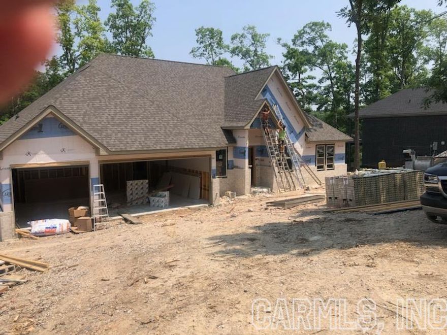 Beautiful new home on Lake Estrella with a completion date expected by September 2023. Carriage home with approximately 2850 square feet.