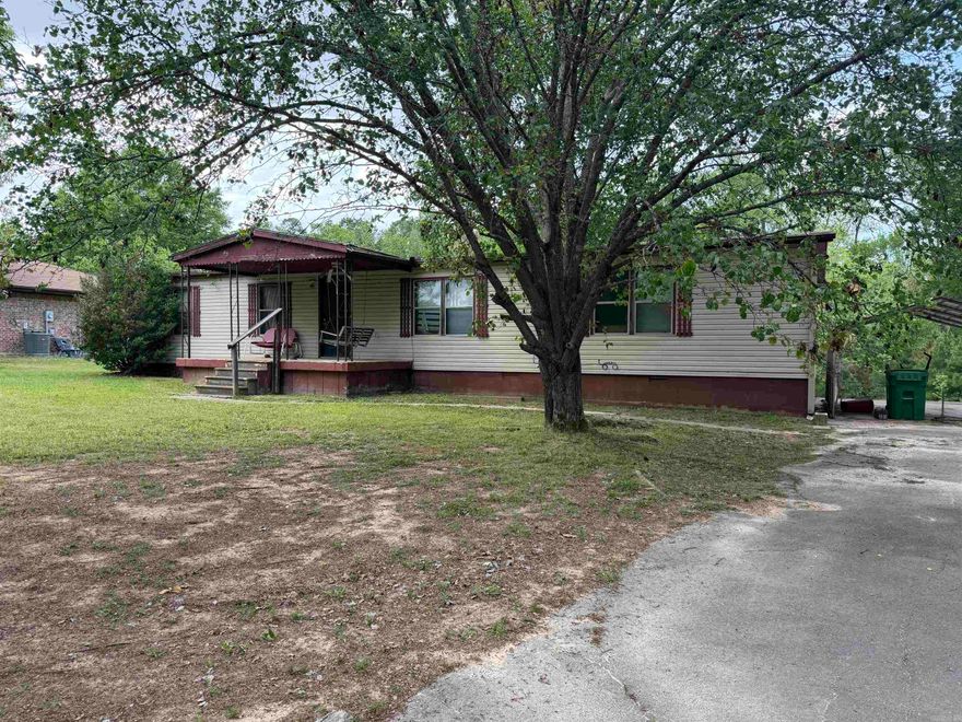 A great investment opportunity on a beautiful .84 acre lot.  With some remodeling and updating this home could easily be used as a first home or investment opportunity, or the mobile home could be removed and a new construction could be built.