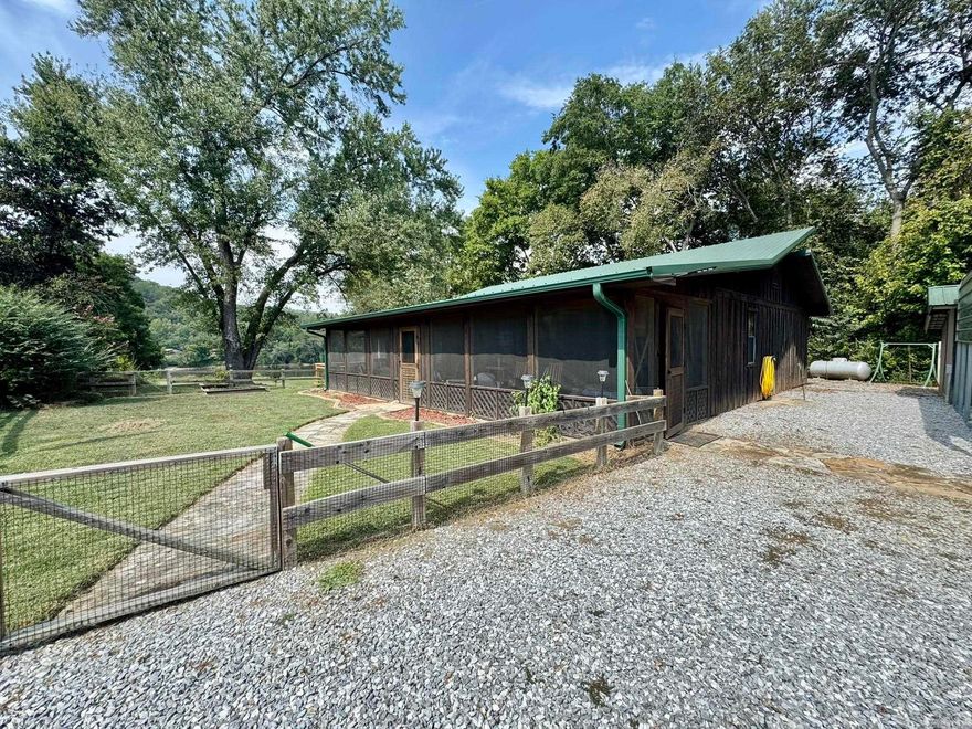 852 & 892 N. Riverview, a unique property offering a home + multiple shops just steps from the White River and minutes from Mountain View!  1,636 sq ft, 2 BR, 1 BA + flex room: Screened-in porch & fresh paint: All major appliances included as well as household furnishings to be included with the exception of personal items: 1,850 sq ft insulated shop w/power: 18x40 metal building (RV/boat storage): 14x18 outbuilding + expanded workshop: and 2.4 acres, mountain views, privacy! Bring your fishing poles, kayaks & imagination – this property has endless potential as a full-time home, vacation getaway, or investment!