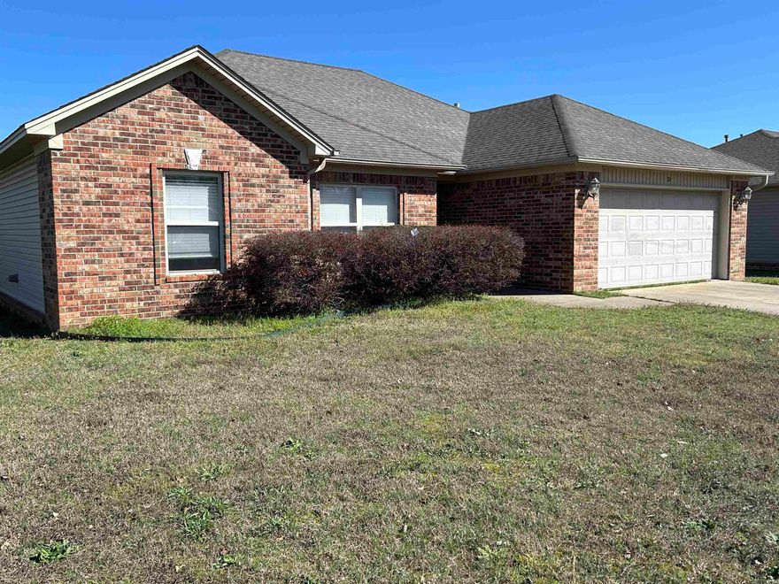 House has been a rental for last few years.  House could use a fresh coat of paint and new carpet.  There is tile in the wet areas.  Covered back patio with extended open air patio.  Refrigerator does convey.  Brand new stove never been cooked in!    Primary bedroom features a walk in closet, private bathroom with dual sinks, jetted tub and separate shower.  New AC evaporator coil 2023.   House is to be sold "AS-IS."