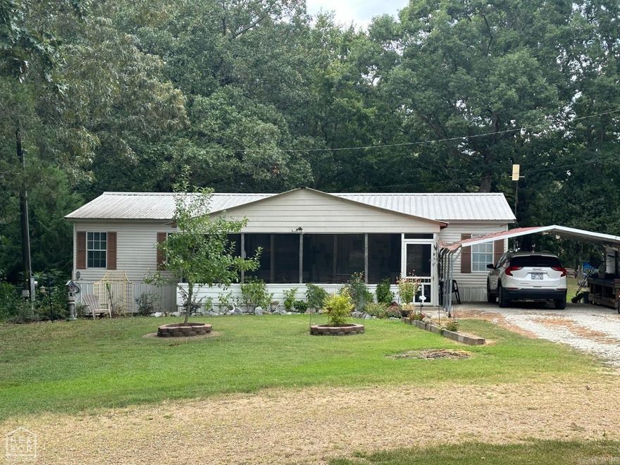 Very nice 1586 sq ft manufactured home on 1.06 acres. This home has been very well maintained. The kitchen and primary bathroom have been updated. There is a large primary bedroom that has a walk-in closet. On the other side of the family room you will find 2 nice size rooms as well as the other bathroom. On the outside you will find several storage buildings.