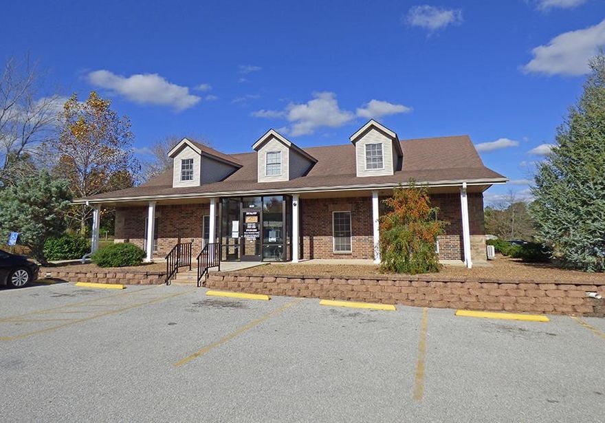 Spacious Commercial Building in Prime Location! This commercial building features over 4,400 square feet of space, nice stained concrete floors. Interior space offers a lobby, six exam/office rooms, main office, 3 restrooms, break room and large upstairs area with another office and three-quarter bathroom. Plenty of parking in front and a 5-car carport across the back. Two heat pump systems and a generator. Building is brick exterior with some vinyl siding. It has US Highway frontage with 2 ingress/egress areas. This property is in close proximity to Emerson, Walmart, Ozarka College, and many other area restaurants and various businesses.