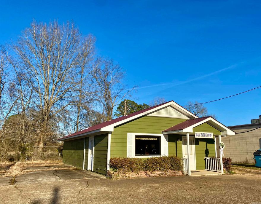 Location, location, location!   The Hair Designer beauty shop is waiting for a new owner. This cute beauty shop has it all, curb appeal, welcoming front porch, and the bright green building sits on Cash Rd. This road is loaded with traffic. It's a main road that joins the Fairview area to downtown Camden.   The shop contains 6 Beauty stalls, a corner area for a nail technician, and a private space in the back for tanning.  It comes fully furnished, including 2.5 baths, a kitchenette, fridge, and washer/dryer.  This shop is ready for business. Call today for your showing!