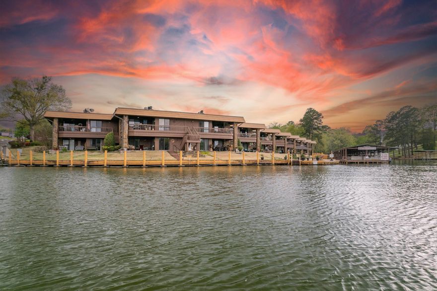 Enjoy Lake Hamilton living just steps from the water! Conveniently located gated ground level condo. Built-ins in primary bedroom and living area. Established family-like complex. Whether you are in search of your personal home or investment property, this unit is worth your attention. This unit may be purchased with a boat dock just off of the patio for $335,000.