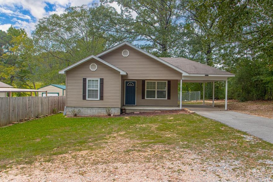 What a doll house!! This precious 3 bed 2 bath home offers a split floor plan, new LVP floors, granite countertops, large living room, nice laundry room. The yard is spacious, flat and fully fenced!
