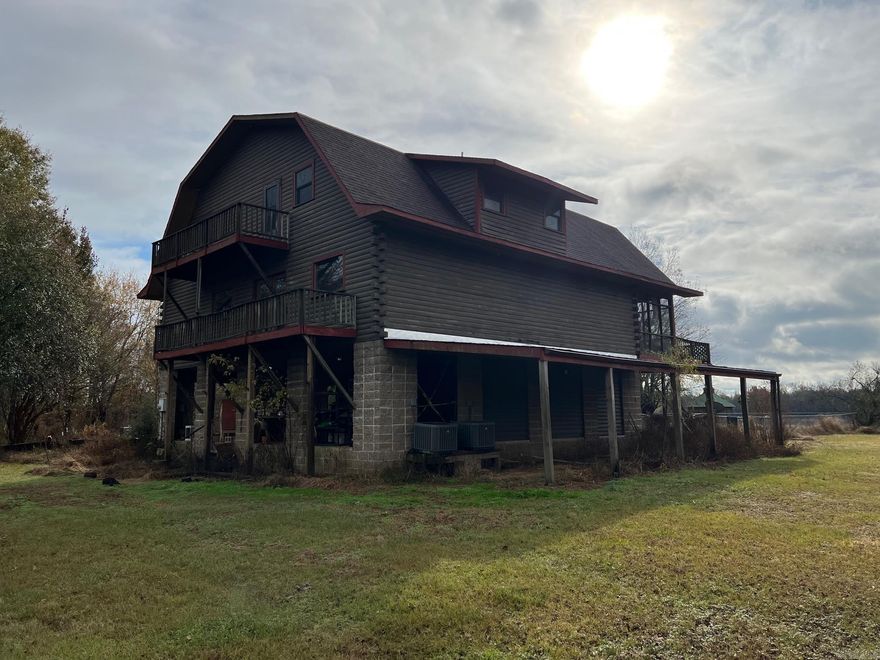Large Custom River Front Home on the Arkansas River up for sale. Sits on almost 7 acres. Nice Shop, Nice Greenhouse, Call today for me details.