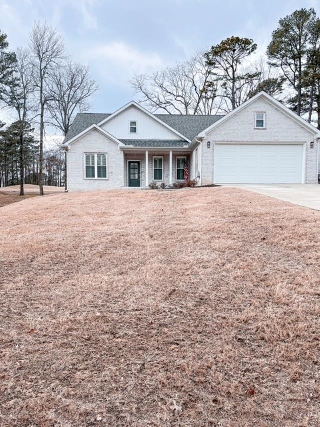 This stunning 2-year-old all-brick home offers a perfect blend of comfort and elegance in the serene setting of Fairfield Bay. Featuring 3 Bedrooms, 2 Baths, Luxury Vinyl Plank Flooring, Quartz Countertops, Farmhouse Trim, Climate-Controlled Garage, Trane HVAC, Wood Shutters, and Walk-Up Attic Storage. Located on the 14th Green of Indian Hills Country Club. Enjoy breathtaking views and modern amenities in this meticulously designed home. Reach us today for more details or to schedule a tour.