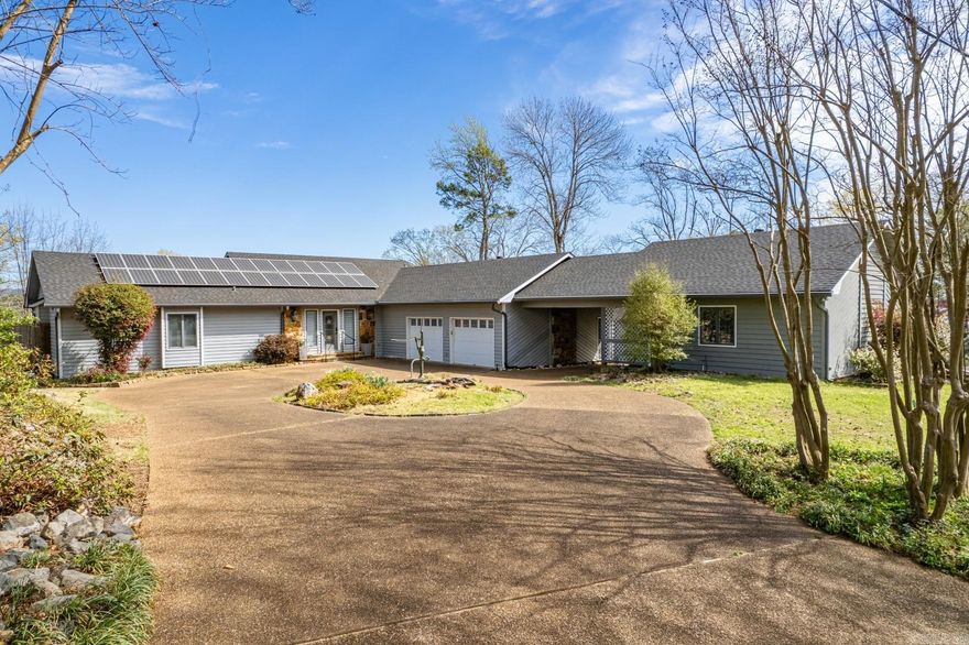 This income-producing residence, in the prestigious Tanglewood Subdivision, captivates with its sweeping water/vista views. The expansive property includes a grand 2-story, 3,480 sqft primary residence, complimented by a 634 sqft attached guest cottage (designed to function independently), totaling 4,000+ sqft of living and entertaining space. Upon entering, you are greeted by an interior that beautifully melds contemporary and traditional architectural elements, awash with natural light. The home offers stunning panoramic vistas from multiple perspectives, including a delightful three-season room, two substantial decks, and all shared living spaces and bedrooms within the primary residence. The outdoor amenities continue to impress with a generous lakeside boardwalk/dock, a perfect setting for swimming, fishing, and unwinding at the water's edge. At a local marina’s recommendation, mooring whips were strategically placed to dock your boat on the main channel safely. It is no wonder 139 Sammie Cove outperforms 95% of its competition with Airbnb awarding it a Top 5% Ranking and guests awarding 40+ 5 Star Reviews (Wow!). This property is a true retreat.