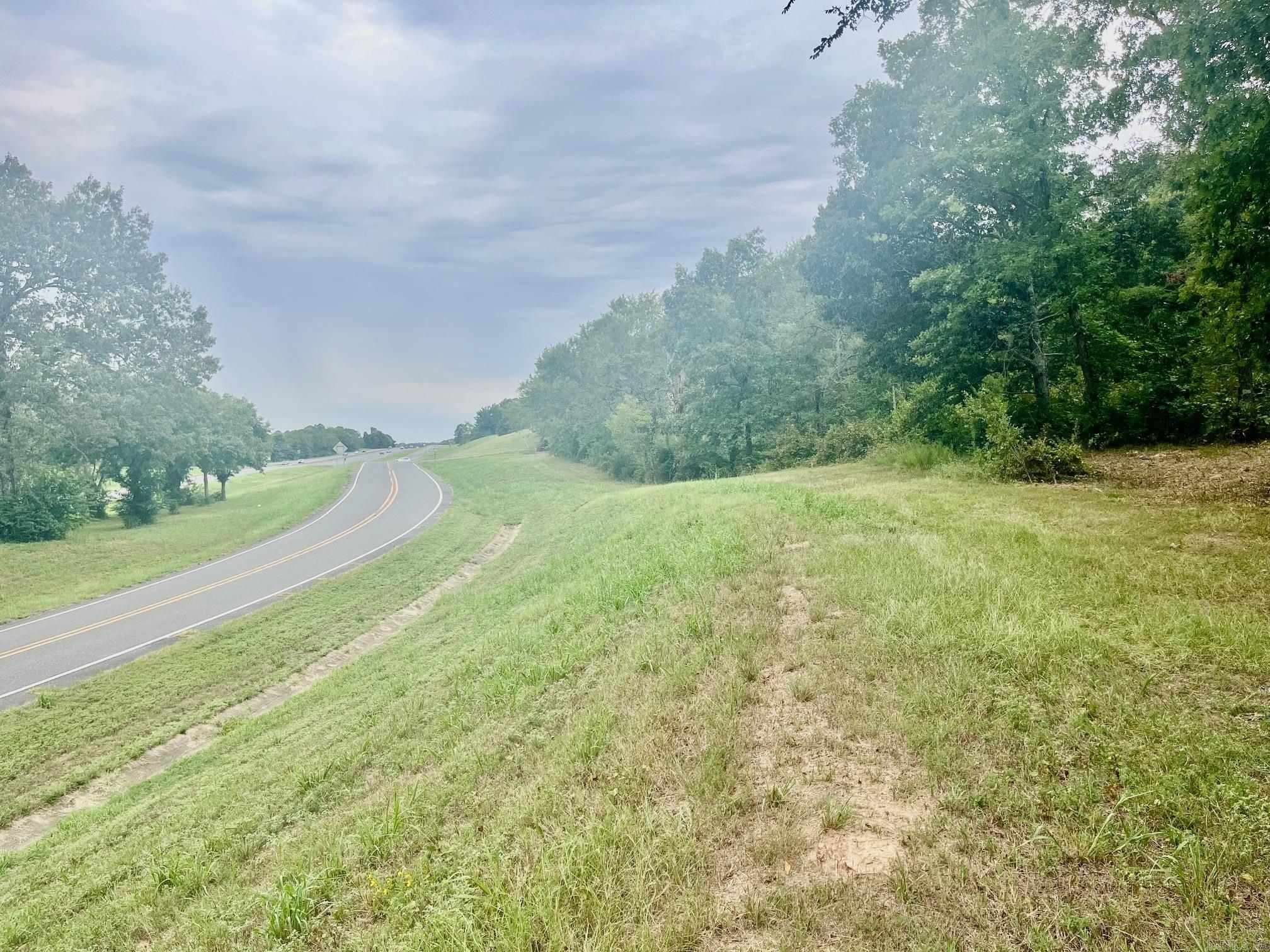 Prime Commerial Land setting in a very high traffic location just off the 270 ByPass and Mcleod St. This 3.5 acres is the perfect building site for numerous types of businesses looking for high visibility. The back property line boarders the Airport so you will not have anything behind the property. Survey and Topo map are alread done and available.