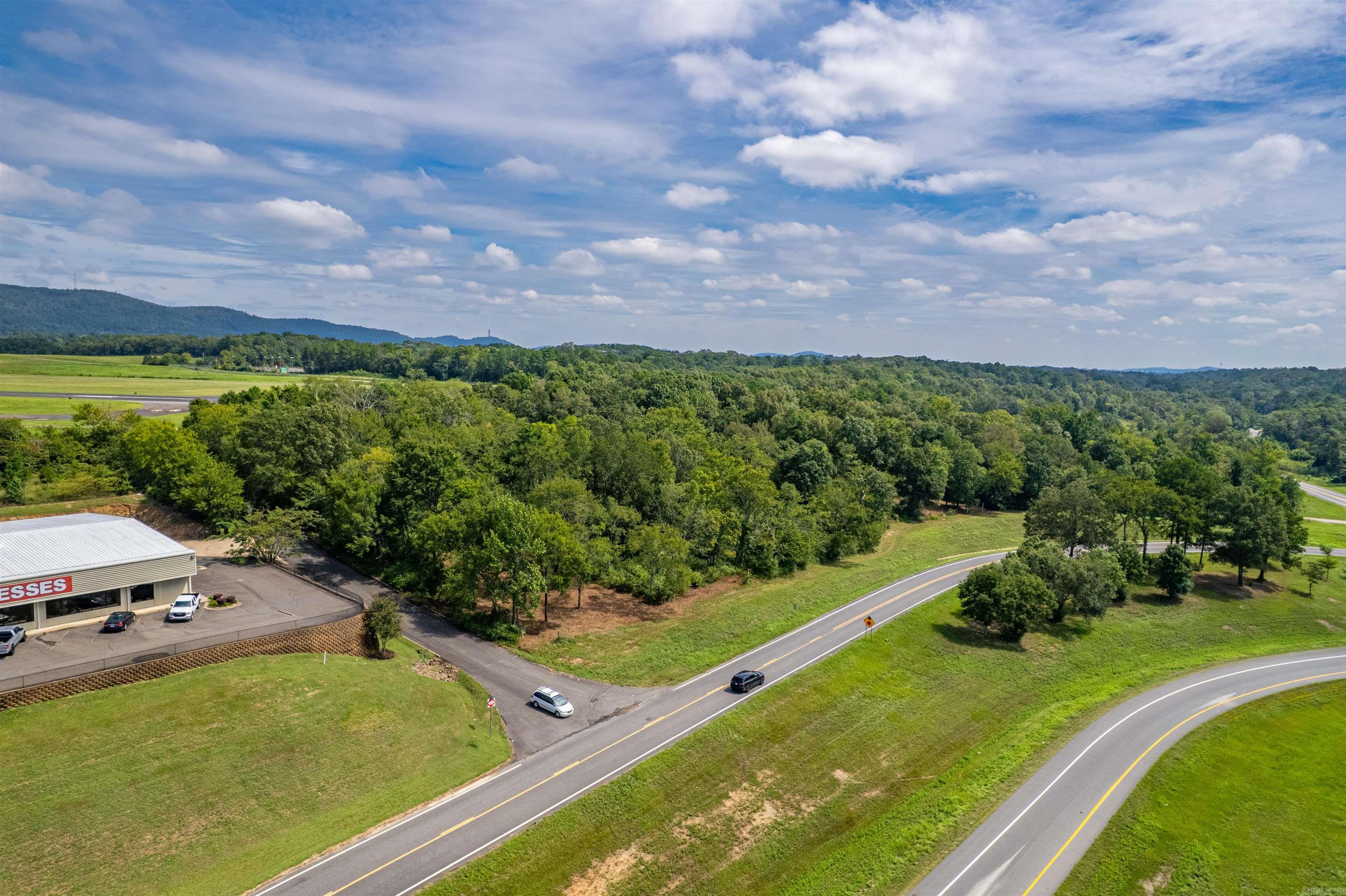 Prime Commerial Land setting in a very high traffic location just off the 270 ByPass and Mcleod St. This 3.5 acres is the perfect building site for numerous types of businesses looking for high visibility. The back property line boarders the Airport so you will not have anything behind the property. Survey and Topo map are alread done and available.