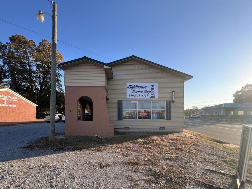 Prime Commercial Opportunity in the Heart of Wynne! This high-visibility corner property on Falls Blvd and Canal Ave offers exceptional exposure and flexible use options. Currently configured as a barber/beauty salon, the building features over 1,000 sq ft of adaptable space, including separate service rooms, a waiting area, restroom, and open areas ideal for a variety of business types. Its strategic location places it just steps from the business district, Cross County Courthouse, Wynne City Hall, Cross Ridge Hospital, law offices, title companies, and other high-traffic professional services, making it perfect for entrepreneurs seeking maximum visibility. Recent updates include a newer roof, updated flooring, fresh paint, and other improvements that enhance both function and appeal. With strong traffic counts and a prominent corner presence, this property offers an outstanding opportunity to establish or expand your business in a thriving area. Call or TEXT the listing agent today for a private tour!