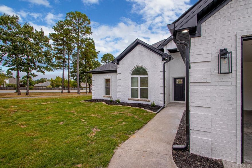 Welcome to 101 Pleasantwood Drive, a beautifully designed one-story traditional home nestled in the desirable Pleasantwood Addition of Maumelle. Built in 2006, this spacious 4-bedroom, 2-bath home offers approximately 2,272 square feet of comfortable living space with a functional layout perfect for both everyday living and entertaining.  Step inside to find inviting living spaces including a formal living room, sunroom, separate dining area, and kitchen/dining combo complete with a breakfast bar. Cozy up by the gas log fireplace while enjoying the warmth and charm this home offers. With a blend of wood, tile, and carpet flooring, central heat and air, and thoughtful design throughout, comfort meets convenience at every turn.  Outside, enjoy a level lot with over 10,000 square feet, a fenced backyard, patio space for relaxing or entertaining, and a large attached garage. Located near Maumelle schools, parks, shopping, and easy interstate access, this home combines location, space, and style.  Don’t miss your opportunity to own this spacious Maumelle gem!