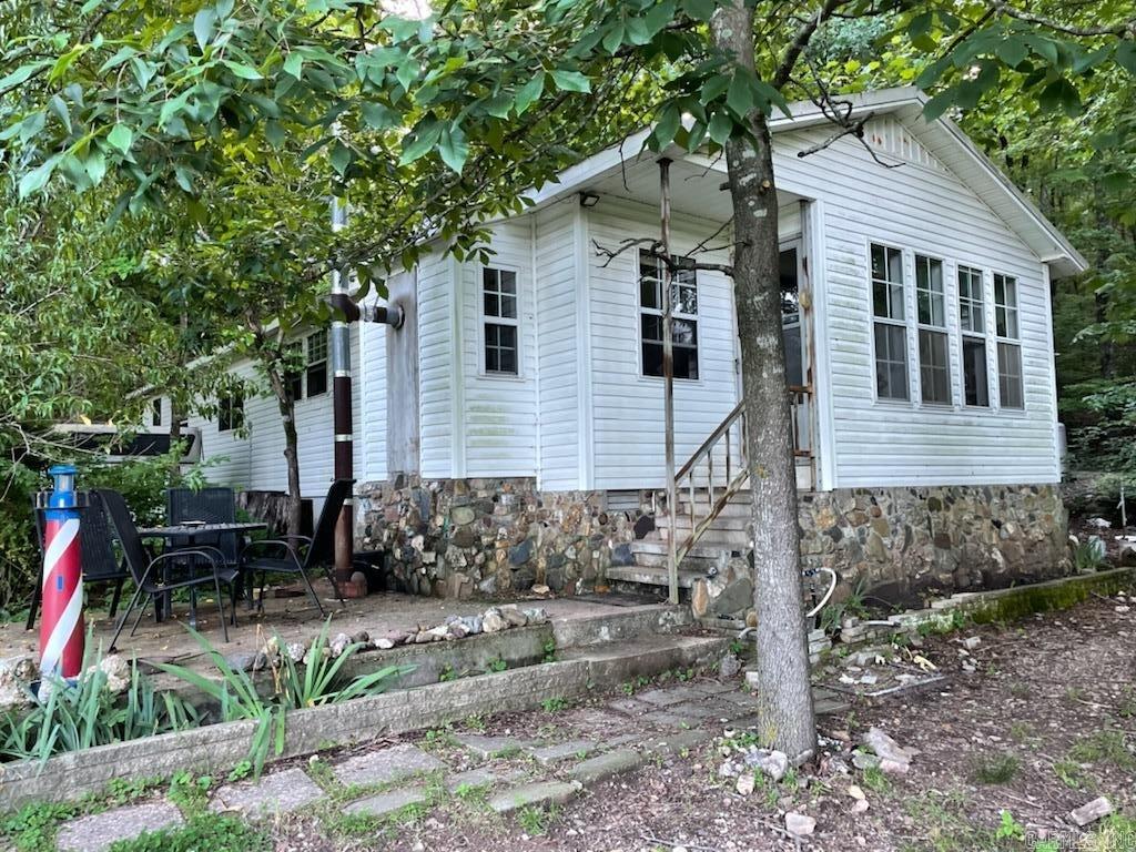 Looking for the ultimate escape? This 60+ acre gem borders the Ouachita National Forest and offers unmatched privacy, natural beauty, and self-sufficient living. Big Fork Creek Frontage. Enjoy 1/4 mile of Big Fork Creek running right through your land ā perfect for peaceful mornings, fishing, and cooling off in the summer. Cozy & Sustainable Home - 2 Bedrooms, 2 Bathrooms, Solar-powered ā truly off-the-grid living, comfortable and efficient with modern convenience. Hunting & Outdoor Paradise with: Prime wildlife habitat for deer, turkey, and bear, wooded acreage with mature hardwood, wet weather springs dot the property. Easy access, yet remote enough to enjoy true solitude. Whether you're looking to homestead, hunt, or just escape, this property offers the rare opportunity to live independently in the heart of nature.