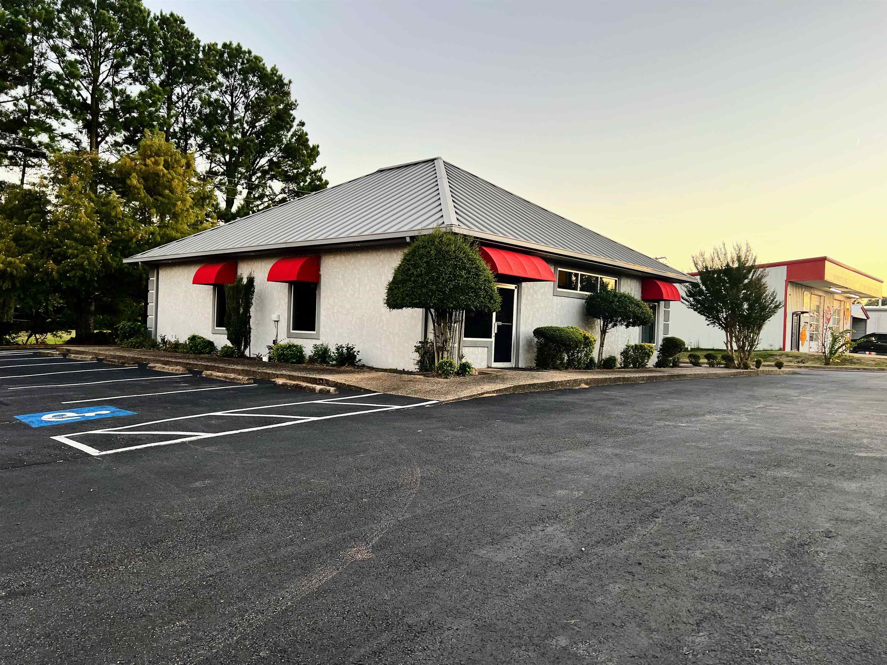 One of the best locations in Mena, Arkansas located on Hwy 71 with excellent parking in front and both sides of building.
