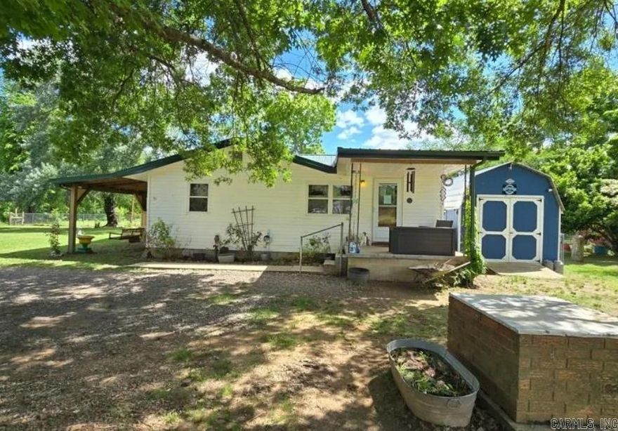 Welcome to your ideal country living retreat! This charming 3-bedroom, 1.5-bath country home is perfectly situated on approximately 40 acres of mixed pasture and woodland in the beautiful Arkansas countryside. Offering a peaceful setting with scenic mountain views, this property is a true haven for those seeking privacy, nature, and self-sufficiency.