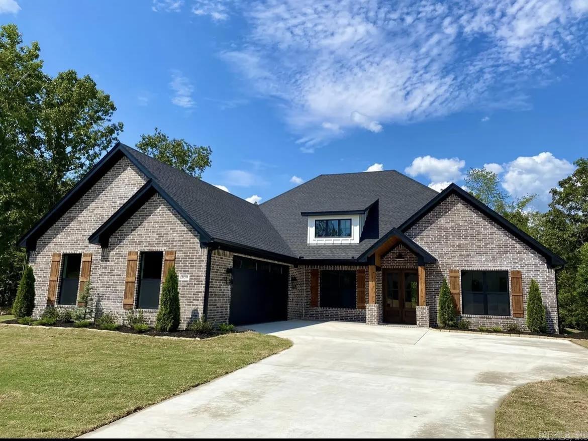 Great new gated subdivision in Bryant Schools with over an acre.