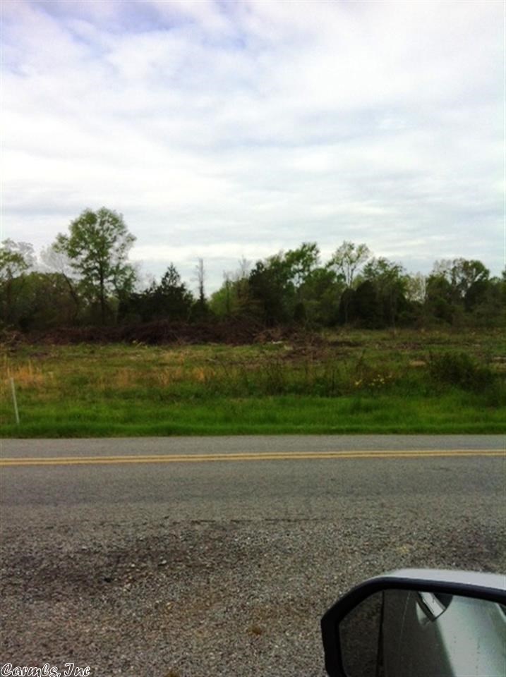 4.7 acres on Hwy 310 and Hackler Road. Hwy 310 splits property, city water. Adjoining acreage available. 1/2 mineral rights convey.