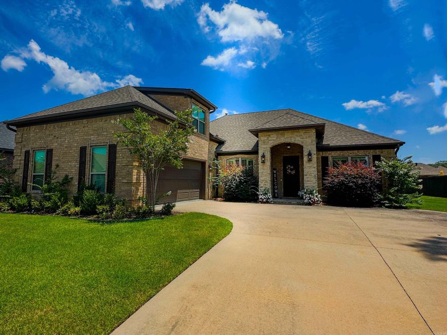 Welcome to your dream home in the desirable Country Club of Arkansas subdivision! This stunning property features a primary bedroom separate from three additional bedrooms, offering privacy and comfort for everyone. Enjoy meals in the separate dining room or breakfast room, both offering  space for entertaining. Custom features such as exposed cedar beams, a floor-to-ceiling stone fireplace, stainless steel appliances with convection options, and granite countertops throughout. This property also features a new roof. The large upstairs bonus room can easily serve as a fourth bedroom or versatile space to suit your needs. Outside, a spacious fenced backyard with a delightful patio area, perfect for relaxing or entertaining. Don't miss out on this exceptional opportunity! Agents see remarks