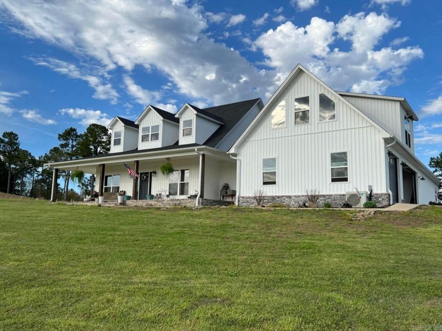 Why Wait? Own Your Dream Home Now!! If you have been dreaming of a True Farmhouse with stunning view of the Valleys and Mountains of Arkansas, now is your chance. This Verlon Farris custom home completed a few short years ago offers 4 bedrooms, 3 full baths, 3 car garage, a bonus living room upstairs, private office w/ fiber optic & a huge kitchen & family room. This 3500 sq ft property was carefully positioned to take full advantage of the views 365 days a year. Land features an additional pasture area w/ pond below, & for all your outdoor needs; a 30 X 50 shop with pass through doors to pull in/pull out with ease. Storage galore from a massive kitchen pantry, the owners suite closet ''room'' & more. AGENTS CALL FOR SHOWING DETAILS