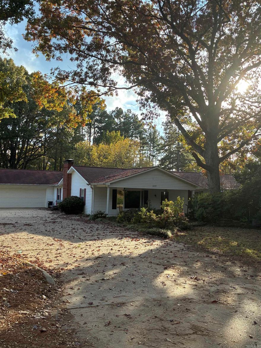 5BR/4.5BA home close to town. Home with lots of custom features and plenty of room for your family. House has a shop included with a large gravel parking lot. Great deal if you are needing a commercial space and a large home too.
