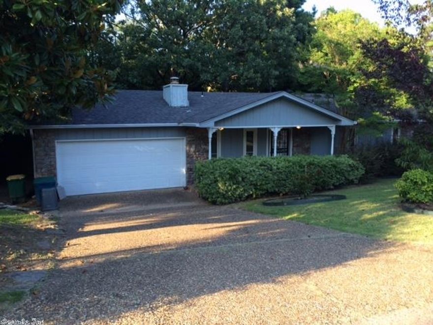 Precious and darling  one level has open floor plan, hardwood floors, huge deck, very private back yard.  Chain link fence, also a dog run fence area.  Good refrigerator, washer/dryer convey with the house.