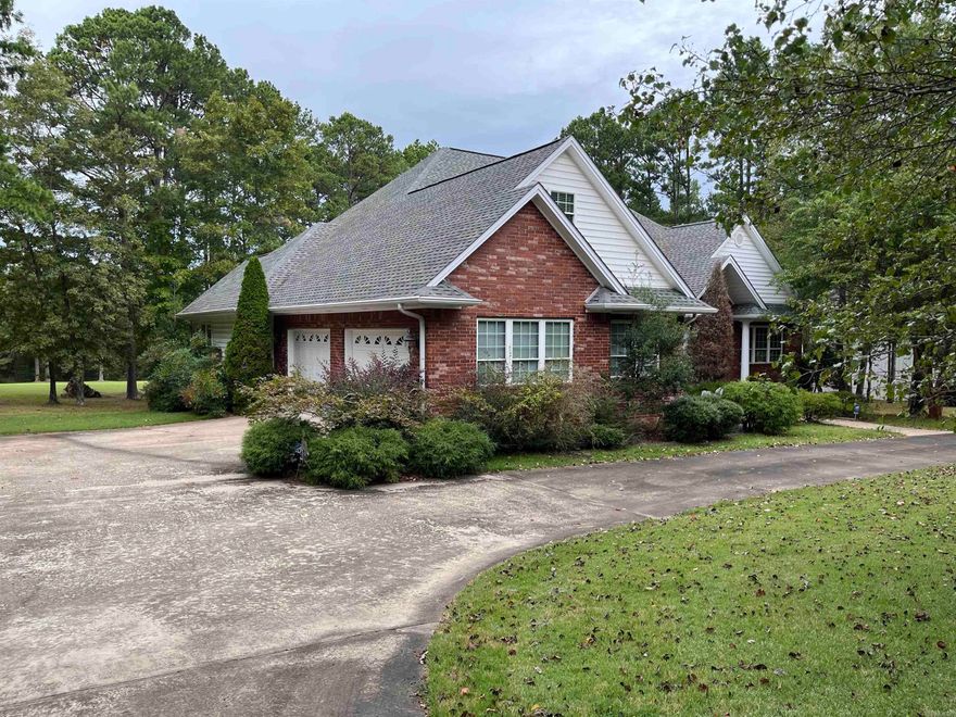 Stunning, custom  built home on the 2nd green of Mountain Ranch Golf Course! From the moment you walk in, you realize the craftmanship that went into this home.  From the mahogany wood floors to the crown molding throughout.   The main level with master ensuite and 2 guest bedrooms that share a jack--n-jill bath to the open living area with fireplace with access to the screened in porch overlooking the lake and 2nd green of Mountain Ranch Golf Course. The heart of the home is the gorgeous gourmet kitchen with custom built-ins, quartz counter tops and recessed lighting.  Eat in dining and also an adjoining formal dining room with tray ceiling to enjoy all those family holiday get togethers. Main level has 2 car heated garage and lower level has 1 car heated garage and 1 garage for lawn equipment, side by side or other toys. Upper level consists of a living area, gameroom/bedroom, and an additional bedroom.  Separate bathroom.  Great mother-in-law suite. All this on 3 beautiful lots on the Golf Course and just minutes to Greers Ferry Lake and Marina!