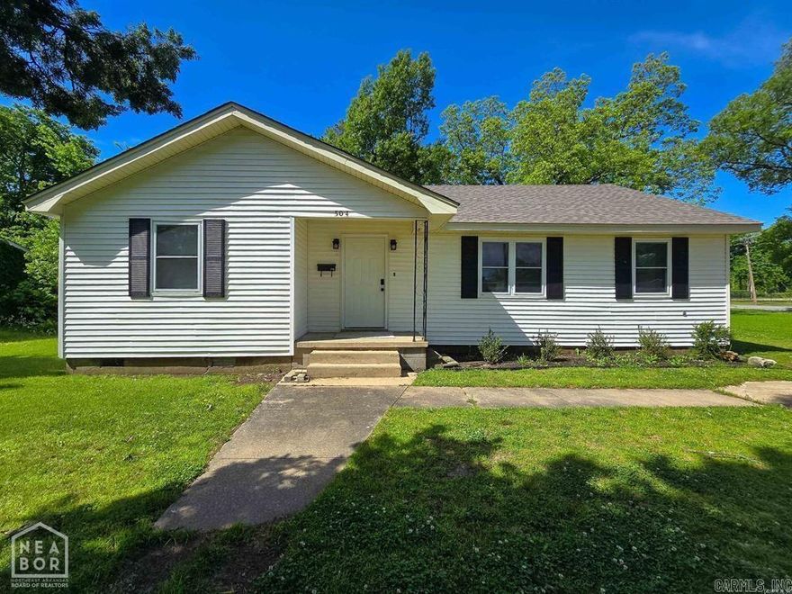 This charming 3-bedroom, 1-bath home is cute as can be and ideally located just across the street from the high school