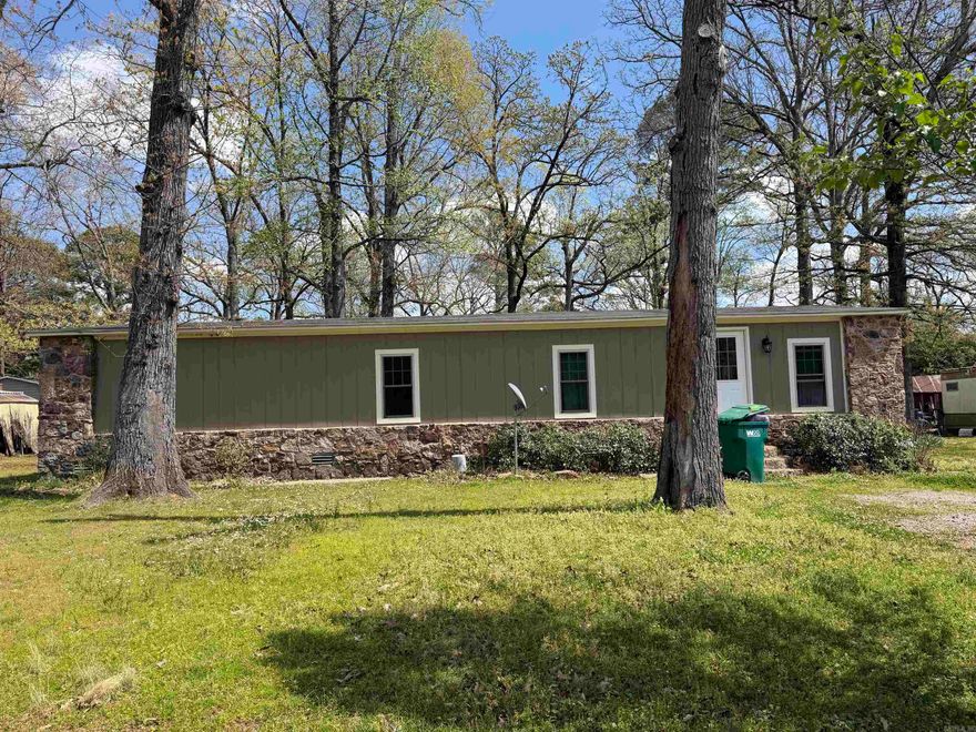 Welcome to this beautifully remodeled 3-bedroom, 2-bath mobile home perfectly situated on a spacious lot, offering both comfort and room to roam. This move-in ready home features fresh updates throughout, including modern flooring, updated fixtures, and a stylish, refreshed interior that creates a warm and inviting atmosphere. The open-concept living area provides plenty of space for relaxing or entertaining, while the kitchen boasts updated cabinetry, ample counter space, and a functional layout ideal for everyday living. The primary suite offers a private retreat with a well-appointed en-suite bath, and the additional bedrooms are generously sized with great closet space. Step outside and enjoy the large lot—perfect for outdoor activities, gardening, or simply soaking in the peaceful surroundings. With plenty of space for parking, pets, or future additions, this property offers both flexibility and value. Whether you're looking for a first home, downsizing, or seeking an investment opportunity, this beautifully updated property is one you won’t want to miss!