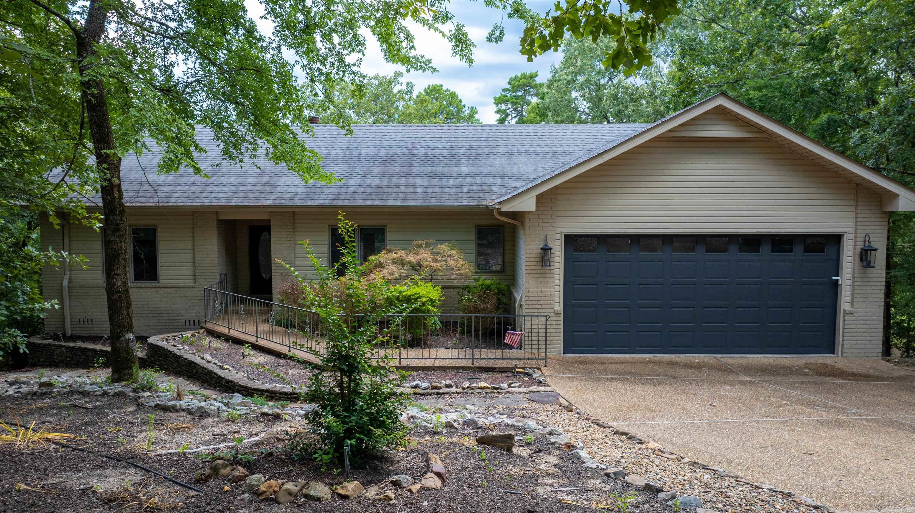 This home is located on the golf course sits on 13th hole. has great views from deck. Home has just been painted, hardwood floors, great room has fireplace and over looks kitchen. Entry has office/dining room. Has bonus room that goes to deck. Primary has full bath/shower. Other two bedrooms share a bathroom . Lots of storage.