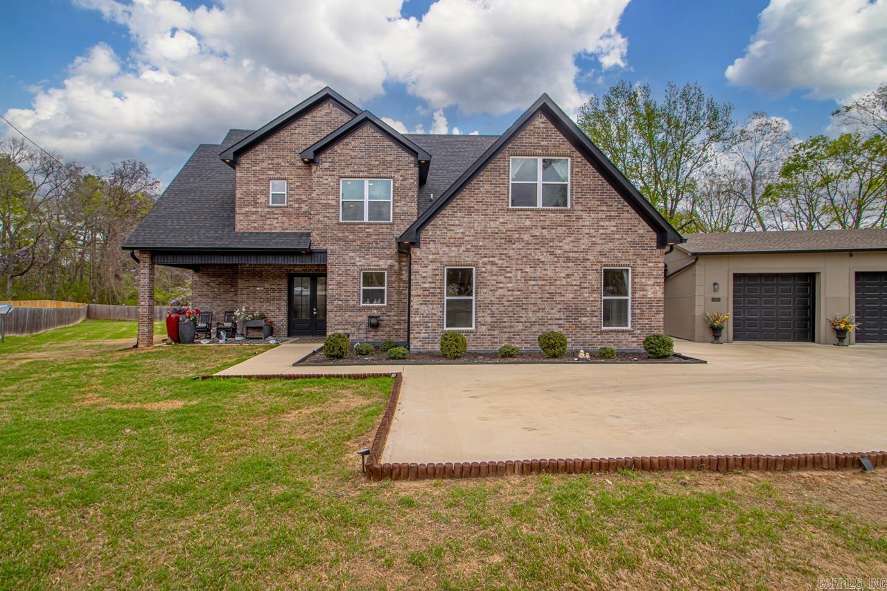 Welcome to this stunning 4 bed, 6 bath home nestled on a spacious one-acre lot, conveniently located mere seconds from Interstate I-30, providing easy access to nearby amenities. As you step inside, you'll be greeted by a spacious and unique living room, featuring a high tray ceiling and a breathtaking chandelier that creates an inviting atmosphere perfect for relaxation and entertaining. The gourmet kitchen, equipped with elegant granite countertops, a double oven, and ample cabinetry for storage, complete with a walk-in pantry for added convenience. On the main level, you'll discover the luxurious owner’s suite, offering a private retreat. Additionally, there’s a cozy man cave/den, ideal for unwinding or entertaining friends and family. Upstairs, you’ll find three generously sized bedrooms, each with its own bathroom, ensuring comfortable accommodations for family members and guests. A versatile bonus room adds to the home's appeal, perfect for various activities such as an office, study, or gameroom. Step outside to the backyard, where a charming fire pit awaits, surrounded by plenty of yard space, while being fully fenced in. Schedule a showing today!