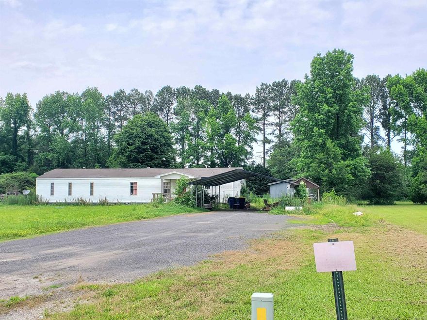Investment opportunity, Home, shop, storage bldg and carport on Property.  Home needs work.  Property is also zoned Multi family so an opportunity to clear the lot and build some multi family.  See Agent Remarks
