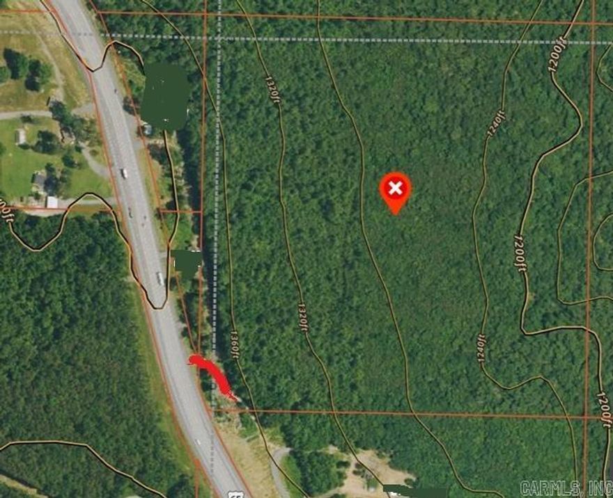 Located in the rolling foothills of the Ozarks, this 40-acre parcel offers a secluded, forested property just under 8 miles north of Clinton, AR. The land is densely wooded, featuring a mix of hardwood & pines.  This would be excellent habitat for deer, turkey, and other small game.  The terrain is gently rolling with a mix of level areas and gradual slopes, ideal for building a home or off-grid living, cabin for huntin or relaxation. Possibly coud be a timber investment.   Call or text today to see