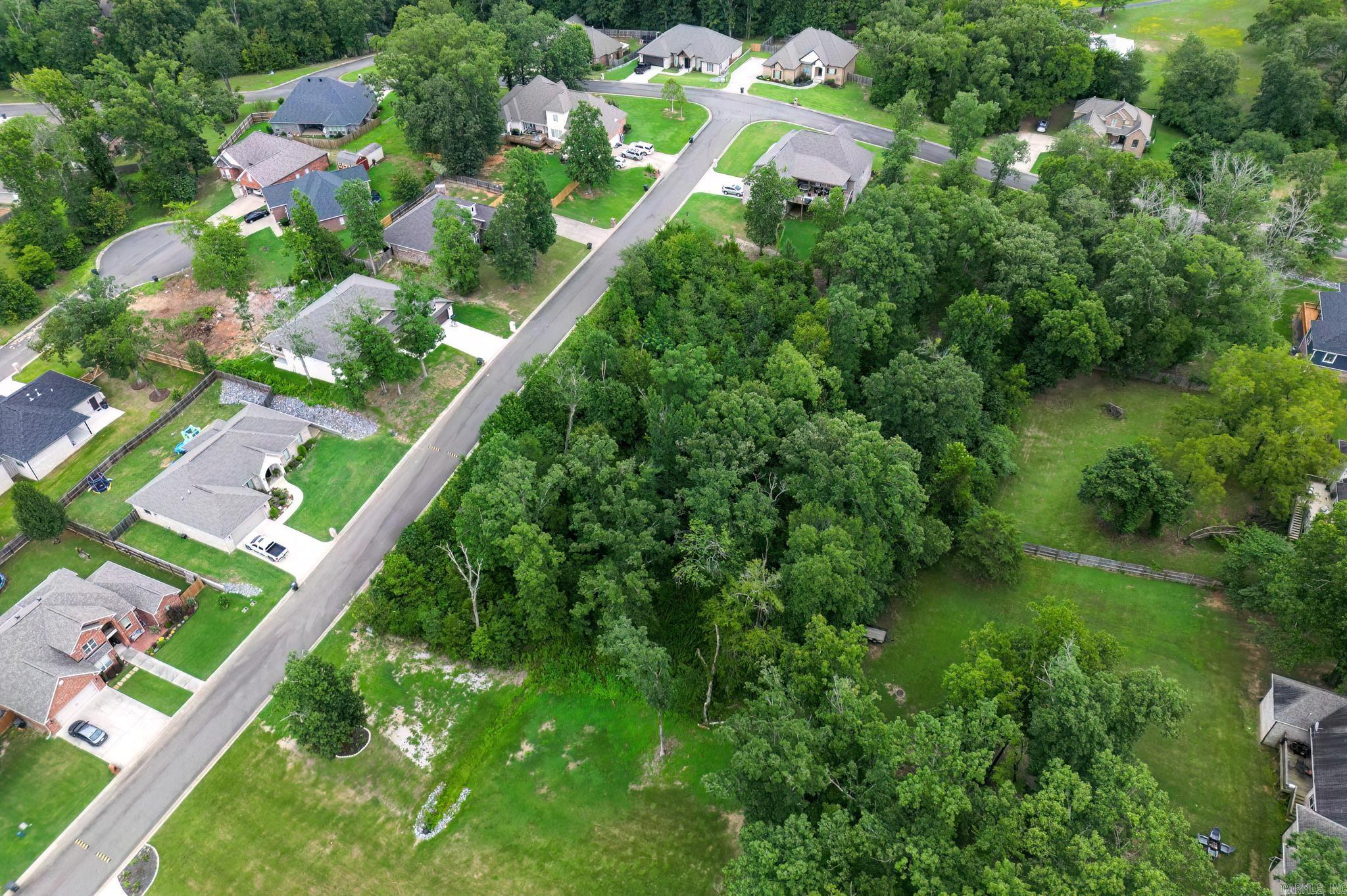 Building lot inside gated community of Eagle Rock with access to pool, fire pit, entertainment area and playground.