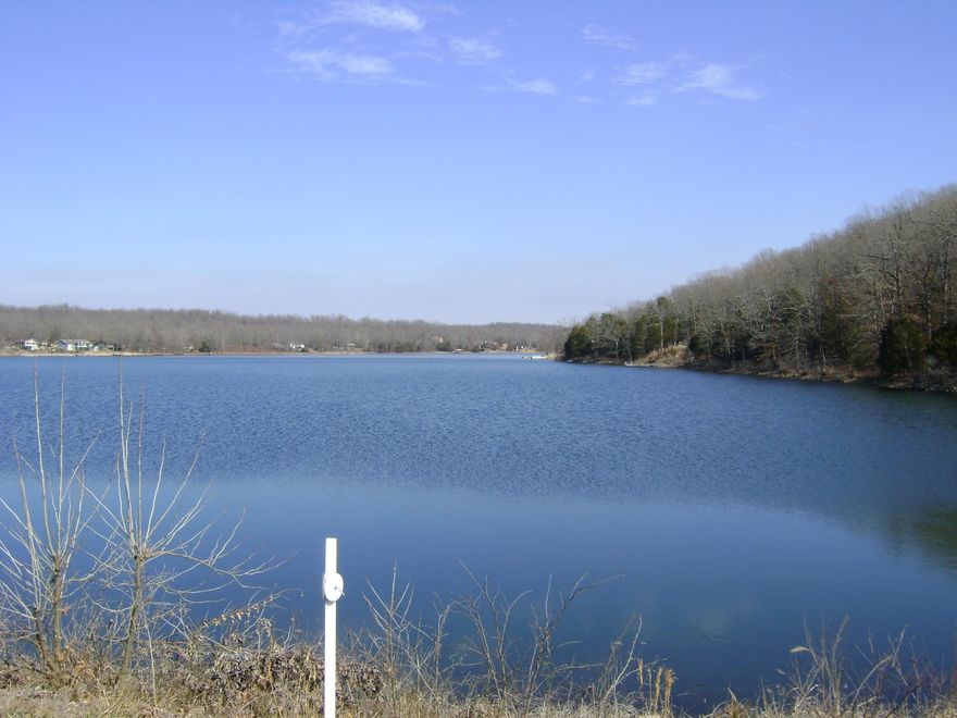 Diamond Lake lot with 224 feet of lake frontage, with a great view. Build your dream home or install a boat dock and swim and fish.  This lake is a no wake lake so come and see for yourself how quiet and peaceful it can be.  It is located in the foothills of the Ozarks with three more lakes and a golf course to enjoy. Possible owner financing. Come see it today.