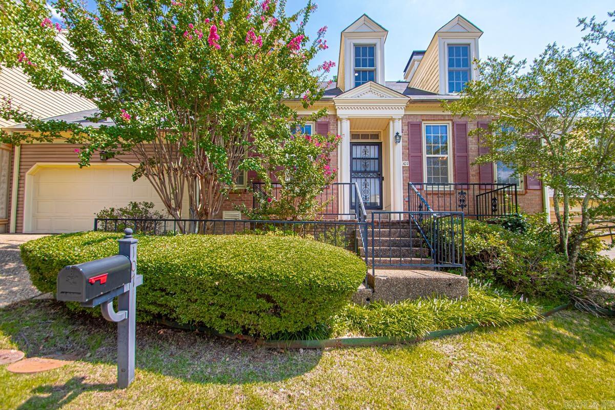 You will love this cozy townhome with wood floors, vaulted ceilings and plenty of storage. The main level features the kitchen, separate dinning, living room with fireplace, an extra room for an office and 2 bedrooms, both with an ensuite. Upstairs has an additional bedroom and full bath, a large bonus room and a separate storage room which could also be a small office (has windows). Enjoy a little sunshine on the back patio on a beautiful day!