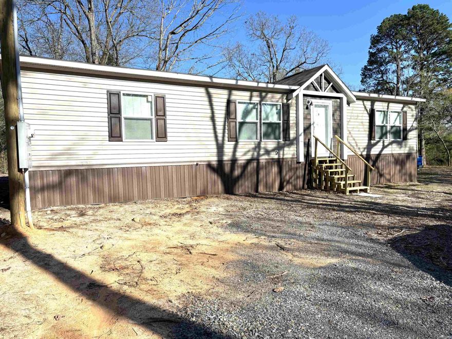 A MUST SEE! Brand new 2024 mobile home, never been lived in!! Come check out this beautiful home on a wonderful 2.65 acres +/-.  New septic has been put in.  Electric and water already hooked up! This is truly move in ready! Kitchen has brand new Frigidaire appliances and the refrigerator stays! This home has a large walk in pantry with a spot for a stand up freezer. Relax after a long day in a large bath tub in the primary bathroom.  Primary bathroom also has a separate stand up shower and double vanity. One of the secondary bedrooms has extra reinforcement underneath to support a large safe. This place is truly a gem, come make it your own!