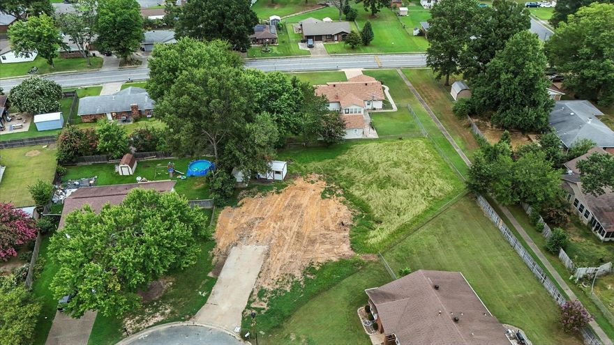 Come build your dream home in the established Stonewall subdivision! This cleared lot at 109 Essex Cove is ready for a fresh start after a house fire led to a full demolition, including the footings. All utilities—water, sewer, gas, and electric—are available on site, saving you time and money when you’re ready to build. Located in a quiet cul-de-sac in with mature trees, wide streets, and a strong sense of community.