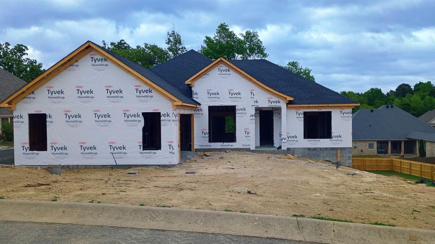 Welcome to your dream home in the highly sought-after Lakeside School District! This brand-new construction boasts a modern and inviting atmosphere with a spacious 3-bedroom, 2.5-bathroom layout. The open floor plan creates a seamless flow from the moment you enter, showcasing luxury vinyl plank flooring that adds a touch of sophistication throughout. The heart of the home is the well-appointed kitchen featuring granite countertops and a gas stove, perfect for culinary enthusiasts. Gather around the cozy fireplace in the living area, creating a warm and inviting ambiance for both family and guests. The master suite is a true retreat, complete with a relaxing tub, separate shower, and ample closet space. Designed for functionality and comfort, the home includes spacious bedrooms with a convenient jack-n-jill bath, an office space for remote work or study, and a large pantry for all your storage needs. Enjoy the convenience of an instantaneous water heater. Covered back patio, providing an ideal space for outdoor entertainment & relaxation. Still time to choose some color options. ***Interior photos are from a home built by the same builder and same plan.