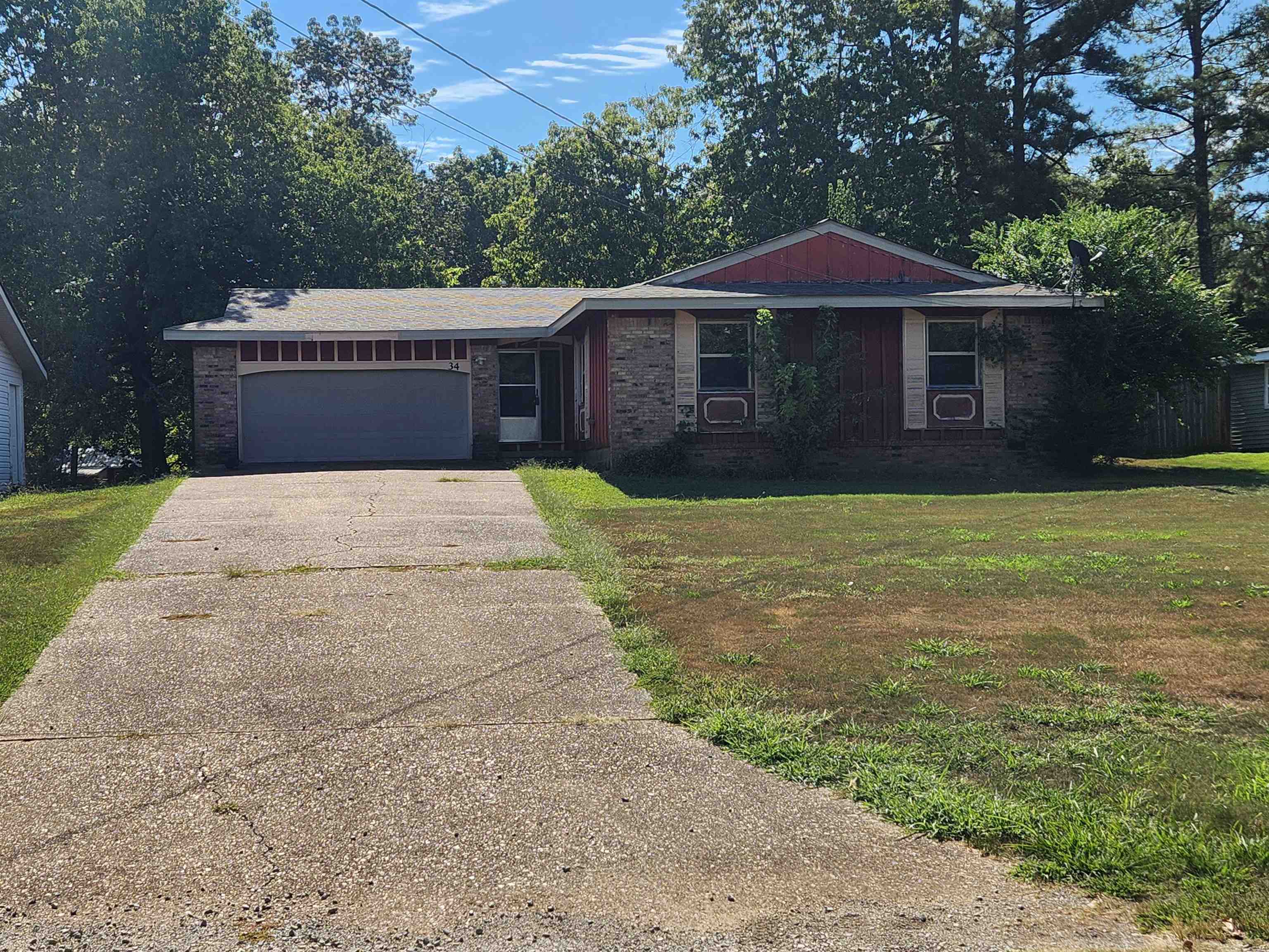 Outstanding 3-bedroom, 2-bathroom home with a 2-car garage. Built in fireplace with an insert. This home can use a little cleaning and TLC but with a little love and elbow grease this could be a wonderful home. Being sold AS-IS, WHERE-IS. Buyers are welcome to have a home inspection for peace of mind. Good bones, Great layout, Good size and a Great location with a large level yard in a wonderful neighborhood at the front of the village. Near schools and churches and less than half a mile from the 4-lane for easy access to shopping, dining and entertainment. Pick this home up at this great price and make it into your showstopper forever home. Or make it your vacation get-away. Don't forget with ownership of this home you gain access to all of the amenities of Cherokee Village Like the two 18-Hole golf courses, the 7 Lakes for boating and fishing, The Thunderbird Center for some Putt-Putt golf and the swimming pool. And the beautiful Southfork River for some tubing, kayaking or fishing.