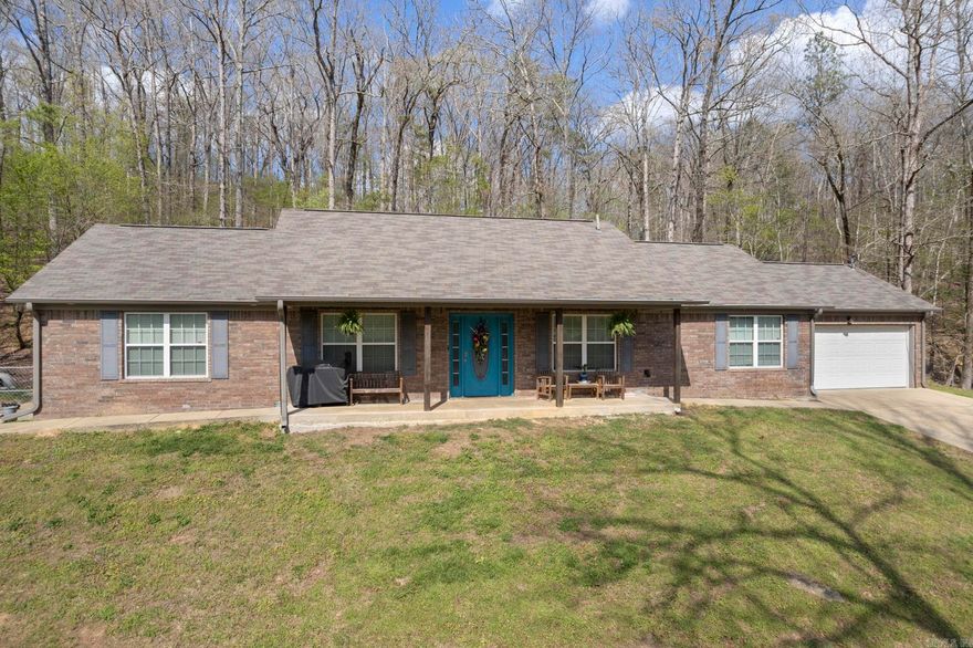 Enjoy peaceful country living on this beautiful 9-acre property offering space, privacy, and plenty of extras. The home features 3 bedrooms, 2 bathrooms, and two comfortable living areas, providing plenty of room for family and entertaining. The property is fully chain-link fenced and gated, making it ideal for animals, hobbies, or simply enjoying your own private retreat. A 20KW Briggs & Stratton whole-home generator provides reliable backup power for added peace of mind. Outdoor features include a 21x18x15 RV/boat shed, a 15x15 chicken coop with electricity and its own water meter, and a 10x10 storage building with electricity. There is also a large 60x24 concrete pad already in place, perfect for a future shop, barn, or additional structure. Located in the Benton School District, this property combines rural charm with practical amenities. 1909 and 1921 Pleasant Run convey with the sale, offering even more opportunity and space. If you’re looking for room to spread out with functional improvements already in place, this property is a must-see. Parcel #s 001-13645-001 & 001-13645-017