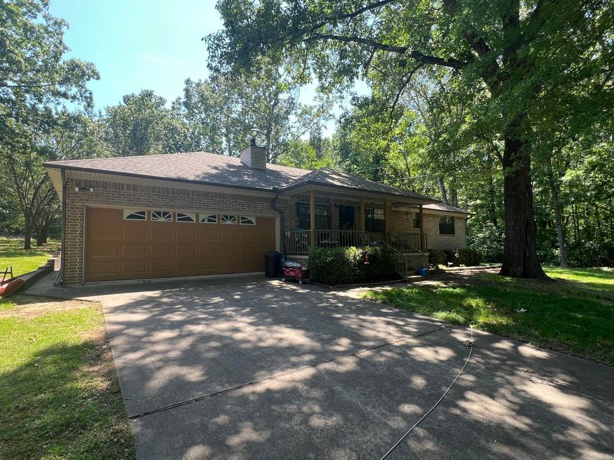 Well Maintained Brick Home Sitting on Almost a acre of land. Private quiet setting Across the street from the Harris Brake Lake. Lake View Home features include 2 bedrooms and 2 bathrooms.  Open floor plan between the kitchen and living areas. Two car garage. Extensive landscaping and Mature trees on the lot