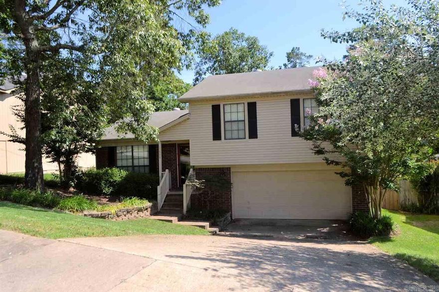 Move in Ready little treasure!  Owners have updated paint, cabinets, quartz counter-tops in kitchen.  Fully fenced large, private backyard with deck.  Living room has vaulted ceilings and hardwood floors.  This home is perfect for first time homebuyer!  Sprinkler system and a double garage. Such a cute well cared for home!