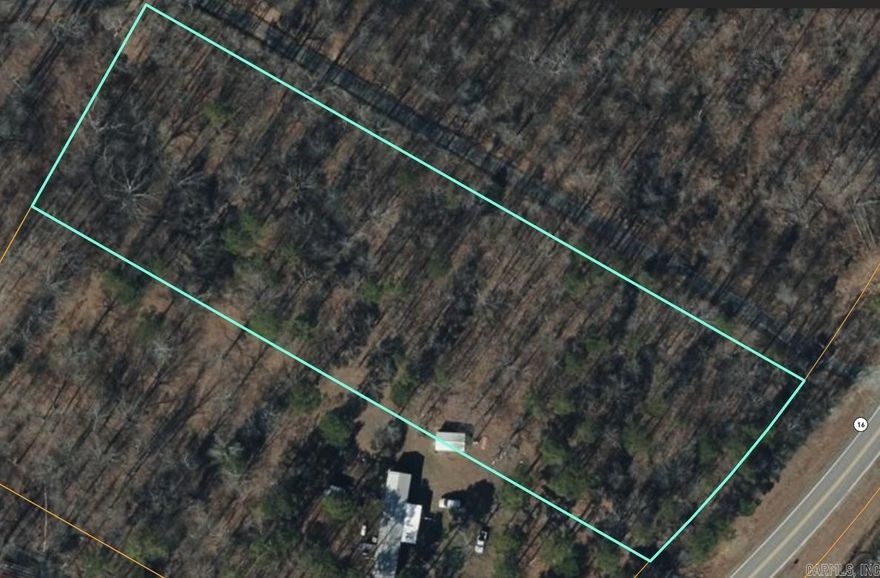 Clear a little ground and its ready for your build or mobile on this property. It is 2-acre m/l unrestricted land, not in city limits. It is subject to health dept approval for septic. Power, fiber and water at the road.  Call to take a look today.