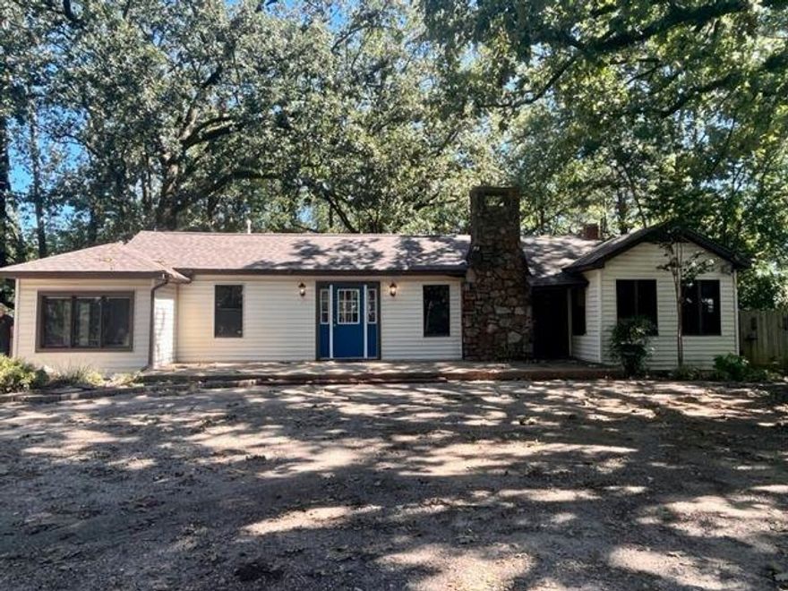 Looking for a charming home in a highly coveted area of Hot Springs? Look no further! This home is situated on a large lot in a prime location, just minutes from everything this vibrant city has to offer. A bonus room for crafting or home office. Seller used it for a salon. Large deck with in a cozy wooded setting perfect for entertaining. Fenced in backyard for privacy, your fur babies and plenty of space for the kids to play. Roof and Trane HVAC replaced 2018