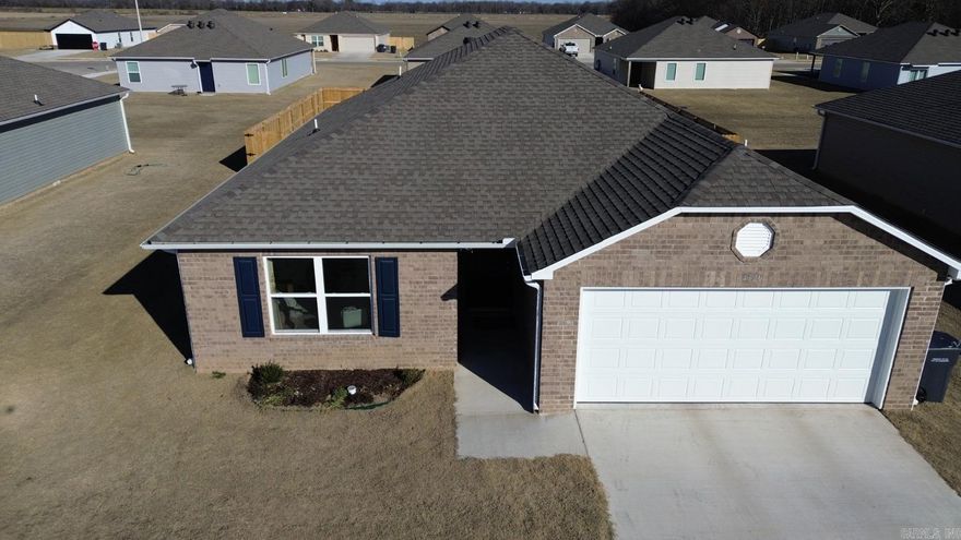 Welcome to this beautiful, like-new home featuring a covered front porch and a beautifully landscaped front yard that create stunning curb appeal. Built just one year ago, this home offers an open floor plan with 3 bedrooms and 2 bathrooms, providing plenty of space for comfortable everyday living. The expansive family room serves as the perfect central gathering place for relaxing or entertaining. Just off the living area, the cozy breakfast/dining space flows seamlessly into a beautiful kitchen complete with energy-efficient appliances, generous counter space, and a spacious pantry perfect for preparing and enjoying family meals. As an added bonus, the refrigerator, washer and dryer, freezer, couch, dining table, and more will remain with the home making this move-in ready opportunity even more appealing!